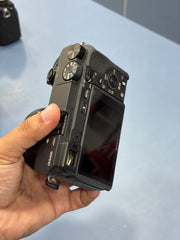 c) Sony alpha a6400 with 16-50mm lens full kit.