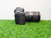 a) Canon EOS 6D Mark II DSLR Camera with 24-105mm Lens | 26.2MP Full-Frame Sensor | Dual Pixel Autofocus | Full HD Video | Versatile L-Series Zoom Kit | SK1055
