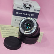 a) Sigma 56mm f/1.4 DC DN Lens | APS-C Portrait Prime | Fast f/1.4 (Code: AB43)