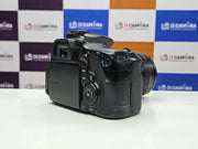 a) Canon EOS 60D DSLR Camera with 18-135mm IS Lens | 18MP APS-C | Full HD Video | Vari-Angle Screen | Semi-Professional DSLR