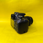a) Canon EOS 1100D with 18-55mm f/3.5-5.6 IS II Lens | Beginner DSLR Camera for Photography & HD Video Shooting | SK196