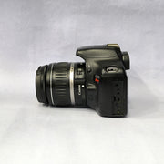 a) Canon EOS Rebel T2i DSLR Camera with 18-55mm Lens | 18MP | Full HD Video | Perfect for Beginners & Creators SK1039