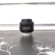 a) Nikon AF-S DX NIKKOR 35mm f/1.8G Lens | Fast Standard Prime Lens for Nikon DX DSLR Cameras | Portrait, Street & Low-Light Photography | SK176