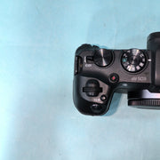 b) Canon EOS RP Full-Frame Mirrorless Camera Body | 26MP | 4K Video | Dual Pixel AF | Compact & Lightweight | SK1021