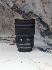 a) Sigma 50mm f/1.4 DG HSM Art Lens (Canon EF Mount) | Ultra-Sharp Prime | Beautiful Bokeh | Low-Light Performer | SK1050