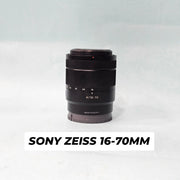 a) Sony Zeiss Vario-Tessar T E 16-70mm f/4 ZA OSS Lens | APS-C E Mount | Constant f/4 Aperture | Premium Zoom Lens | SK1066