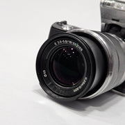 b) Sony NEX-5 with 18-55mm OSS Lens | Compact Mirrorless Camera Kit | SK503