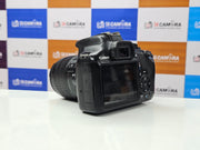 a) Canon EOS 1300D DSLR Camera with 18-55mm Lens | 18MP APS-C | Full HD Video | WiFi | Beginner Friendly DSLR