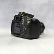 b) Canon EOS 1500D DSLR Camera with 18-55mm IS II Lens | 24.1MP | Full HD Video | WiFi | AB04
