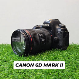 a) Canon EOS 6D Mark II DSLR Camera with 24-105mm Lens | 26.2MP Full-Frame Sensor | Dual Pixel Autofocus | Full HD Video | Versatile L-Series Zoom Kit | SK1055
