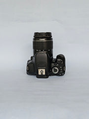 a) Canon EOS 650D DSLR Camera with 18-55mm f/3.5-5.6 IS Lens | 18MP APS-C Sensor | Full HD Video | Vari-Angle Touchscreen | Beginner Friendly Photography Camera 📸🔥