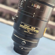 a) Nikon AF-S NIKKOR 600mm f/4E FL ED VR Lens | Super Telephoto Prime | Wildlife & Sports (Nikon F-Mount)