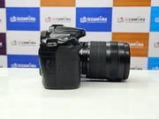 a) Canon EOS 70D DSLR Camera with 18-135mm IS Lens | 20.2MP APS-C Sensor | Dual Pixel Autofocus | Full HD Video | Versatile Zoom Kit | SK1053