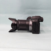 a) Canon EOS R7 Mirrorless Camera with RF-S 18-150mm IS STM Lens | 32.5MP APS-C | 4K 60p Video | Fast Dual Pixel CMOS AF II | High-Speed Hybrid Camera | SK1064