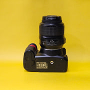 b) Nikon D3100 DSLR Camera with 18-55mm G VR Lens | 14.2MP | Full HD Video | Beginner Friendly DSLR | Budget Photography Camera | Code AB06 📸