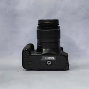 a) Canon EOS 600D DSLR Camera with 18-55mm Lens | 18MP | Vari-Angle Display | Perfect for Beginners & Creators SK1038