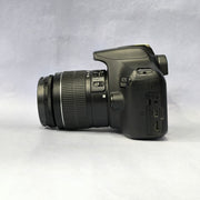 b) Canon EOS 1500D DSLR Camera with 18-55mm IS II Lens | 24.1MP | Full HD Video | WiFi | AB04