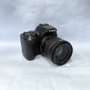 a) Canon EOS 200D Mark II with 18-55mm f/4-5.6 IS STM Lens | 24.1MP Compact DSLR Camera Kit for Photography, 4K Video Recording, Vlogging & Content Creation | SK195