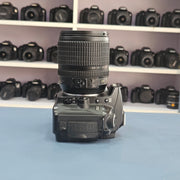 b) Nikon D90 DSLR Camera with 18-105mm VR Lens | 12.3MP | HD Video | Reliable Nikon DX Camera | SK252