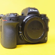 a) Nikon Z7 II Mirrorless Camera Body | 45.7MP Full-Frame | 4K Video (Code: AB42)