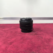 a) Nikon AF Nikkor 50mm f/1.8D Lens | Fast Standard Prime Lens for Nikon DSLR | Sharp Portrait & Low-Light Lens | Compact 50mm Prime Lens