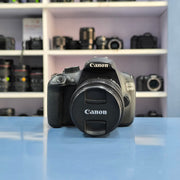a) Canon EOS 1200D DSLR Camera with 18-55mm IS II Lens | 18MP | Full HD Video | Beginner Friendly | AB02