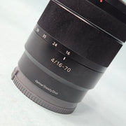 a) Sony Zeiss Vario-Tessar T E 16-70mm f/4 ZA OSS Lens | APS-C E Mount | Constant f/4 Aperture | Premium Zoom Lens | SK1066