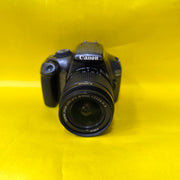 a) Canon EOS 1100D with 18-55mm f/3.5-5.6 IS II Lens | Beginner DSLR Camera for Photography & HD Video Shooting | SK196