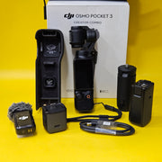 a) DJI Osmo Pocket 3 Creator Combo | 1-inch CMOS Sensor | 4K/120fps | 3-Axis Gimbal | Vlogging Camera Kit