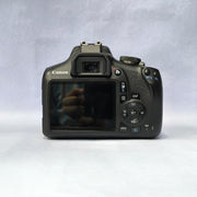 b) Canon EOS 1500D DSLR Camera with 18-55mm IS II Lens | 24.1MP | Full HD Video | WiFi | AB04