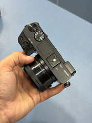 c) Sony alpha a6400 with 16-50mm lens full kit.
