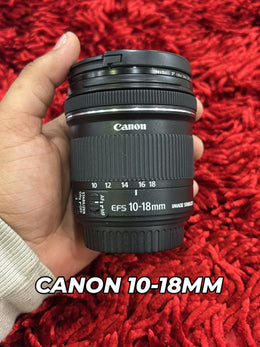 b) Canon EF-S 10-18mm f/4.5-5.6 IS STM lens SK1005