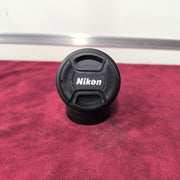 a) Nikon AF Nikkor 50mm f/1.8D Lens | Fast Standard Prime Lens for Nikon DSLR | Sharp Portrait & Low-Light Lens | Compact 50mm Prime Lens