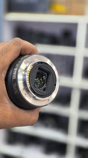 c) Sony Alpha A6400 + 18-135mm Zoom Lens (Excellent Condition)