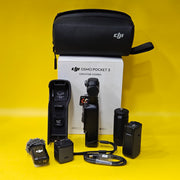 a) DJI Osmo Pocket 3 Creator Combo | 1-inch CMOS Sensor | 4K/120fps | 3-Axis Gimbal | Vlogging Camera Kit
