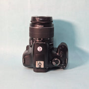 Pre-owned Canon 1300D + EF-S 18-55mm IS II lens AS24