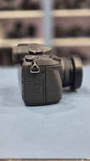 c) Panasonic Lumix G85 with 14-42mm Lens – 16MP 4K Mirrorless Camera | Weather-Sealed | 5-Axis Stabilization
