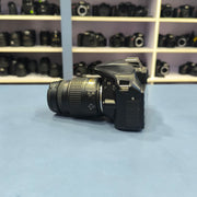 a) Nikon D3400 with 18-55mm VR Lens | 24.2MP Entry-Level DSLR Camera | Compact & Beginner Friendly | SK147