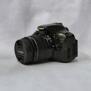 a) Canon EOS 600D DSLR Camera with 18-55mm Lens | 18MP | Vari-Angle Display | Perfect for Beginners & Creators SK1038