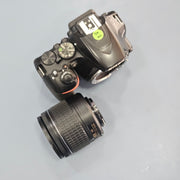 b) Nikon D3500 + 18-55mm Kit Lens | Beginner Friendly DSLR | Lightweight & Powerful | SK251
