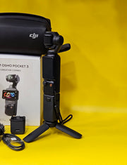 a) DJI Osmo Pocket 3 Creator Combo | 1-inch CMOS Sensor | 4K/120fps | 3-Axis Gimbal | Vlogging Camera Kit