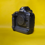 a) Canon EOS-1D X Mark II DSLR Camera Body | 20.2MP Full Frame | 4K Video | 14fps Burst | Flagship Professional Camera