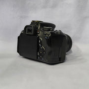 a) Canon EOS 600D DSLR Camera with 18-55mm Lens | 18MP | Vari-Angle Display | Perfect for Beginners & Creators SK1038
