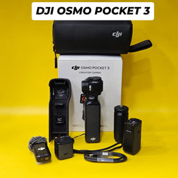 a) DJI Osmo Pocket 3 Creator Combo | 1-inch CMOS Sensor | 4K/120fps | 3-Axis Gimbal | Vlogging Camera Kit