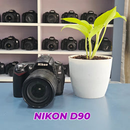 b) Nikon D90 DSLR Camera with 18-105mm VR Lens | 12.3MP | HD Video | Reliable Nikon DX Camera | SK252