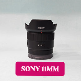 a) Sony E 11mm f/1.8 Ultra Wide-Angle Prime Lens | APS-C E-Mount | Fast f/1.8 Aperture | Lightweight Vlogging & Landscape Lens | SK1058