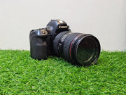 a) Canon EOS 6D Mark II DSLR Camera with 24-105mm Lens | 26.2MP Full-Frame Sensor | Dual Pixel Autofocus | Full HD Video | Versatile L-Series Zoom Kit | SK1055
