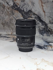 a) Sigma 50mm f/1.4 DG HSM Art Lens (Canon EF Mount) | Ultra-Sharp Prime | Beautiful Bokeh | Low-Light Performer | SK1050