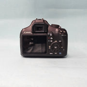 a) Canon EOS 1100D DSLR Camera with 18-55mm IS II Lens | 12.2MP APS-C | Beginner Friendly Camera | Lightweight DSLR | (Code AB01)