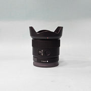 a) Sony E 11mm f/1.8 Ultra Wide-Angle Prime Lens | APS-C E-Mount | Fast f/1.8 Aperture | Lightweight Vlogging & Landscape Lens | SK1058